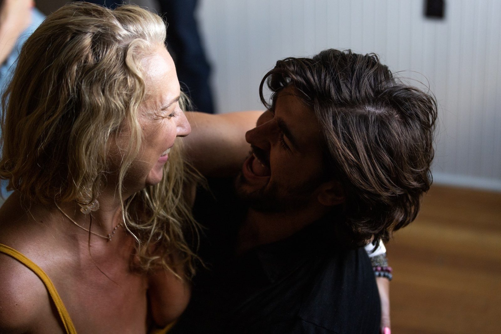 Alternate: couple laughing together close