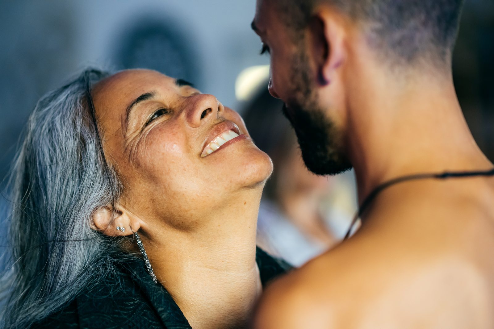 A couple in a tender moment during a guided practice